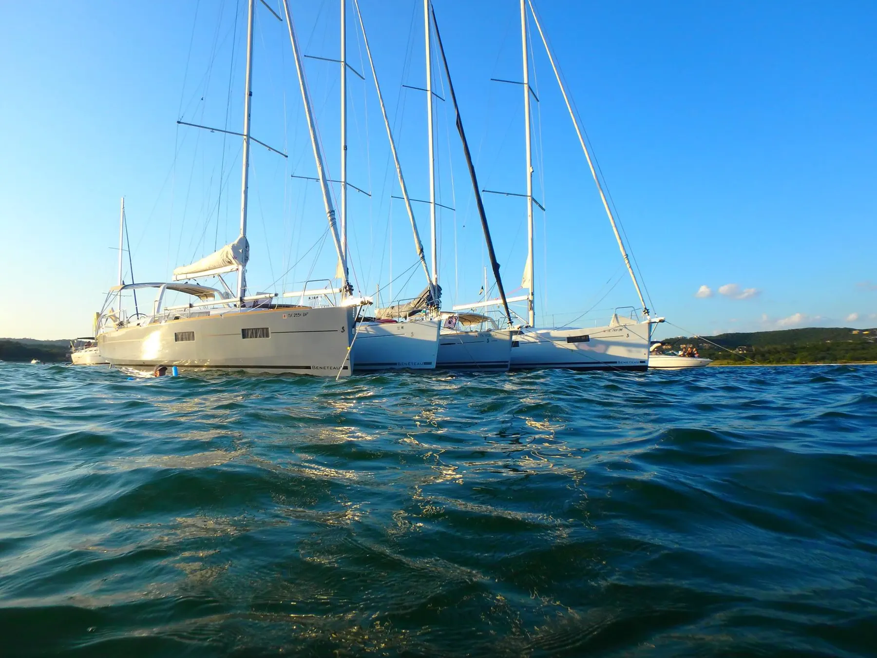 Corporate group on sailing yachts during a Texas Sailing team-building regatta on Lake Travis